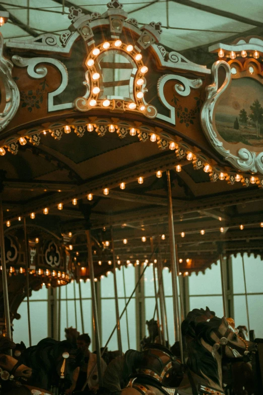 a carousel with a bunch of seats and lights