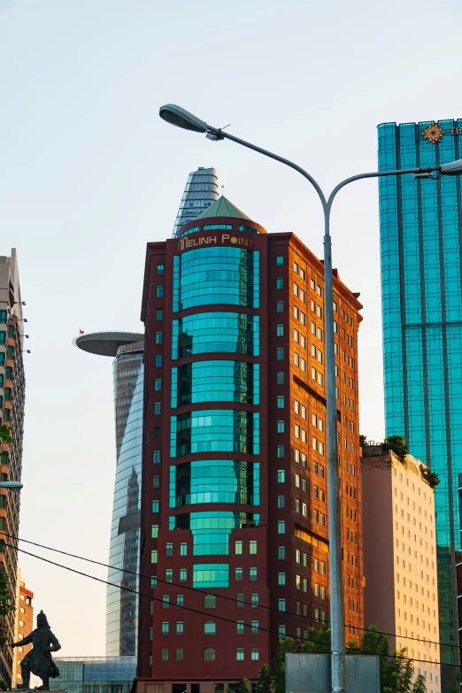 cityscape with street lights and tall buildings in the background