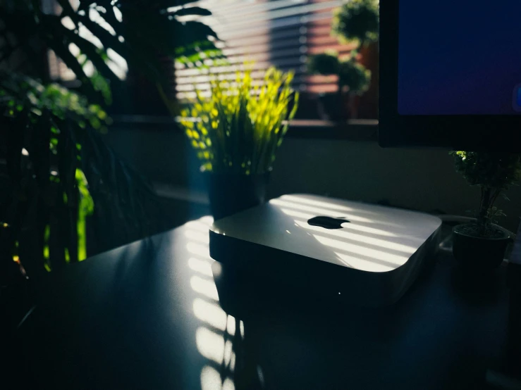 an image of an apple computer screen on the table