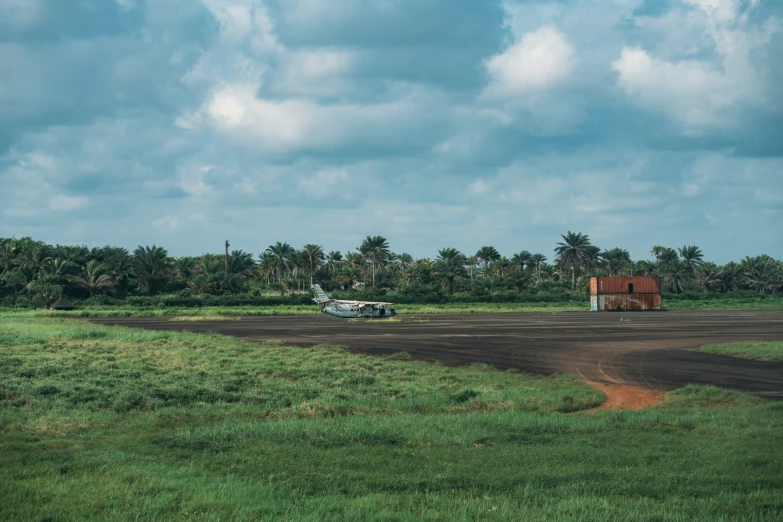 an airplane sitting on top of a runway