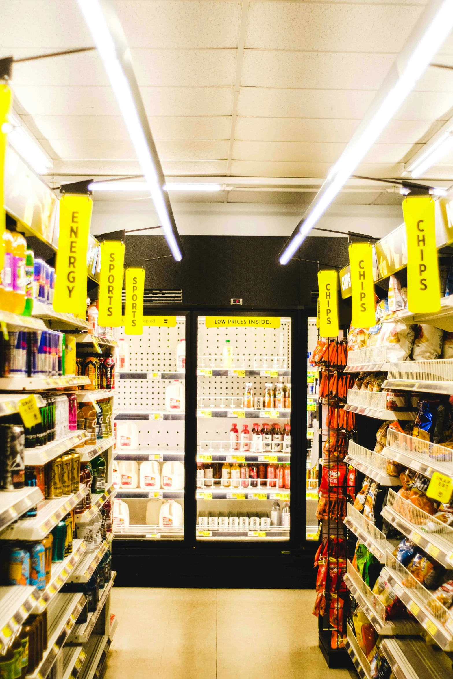 the aisle in a store with many items for sale