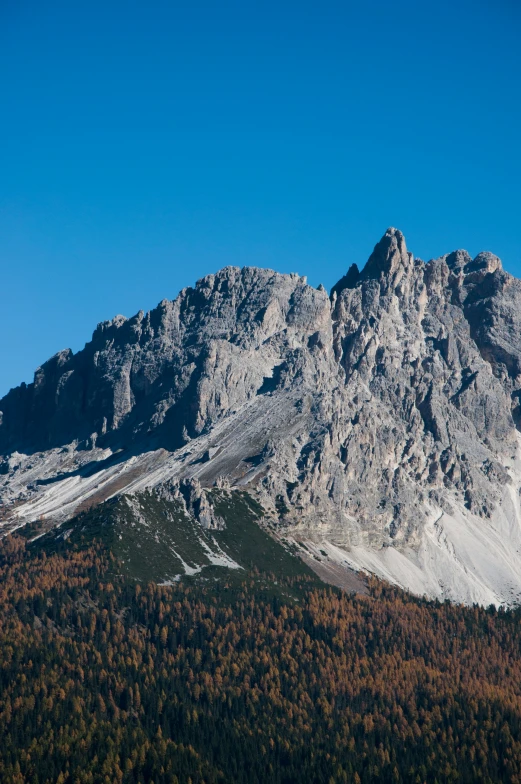 a view of the rocky peak of a mountain