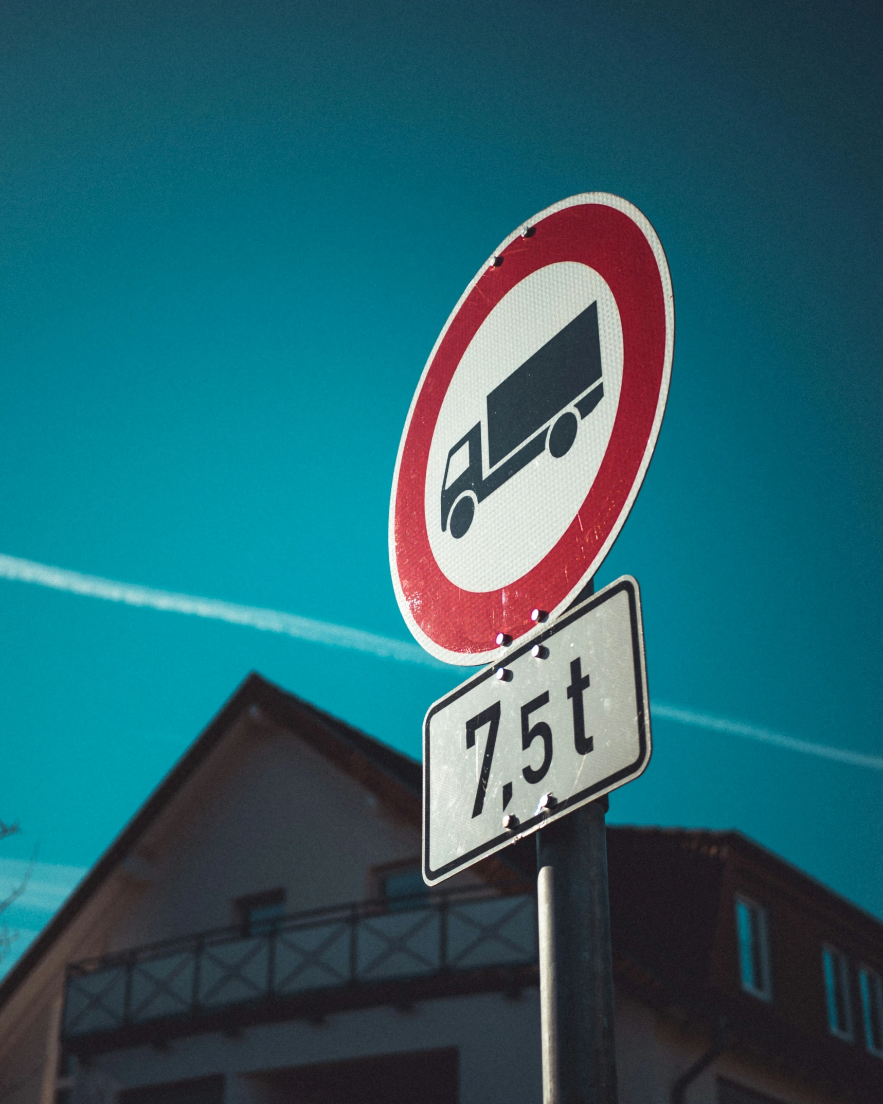 two traffic signs on top of each other