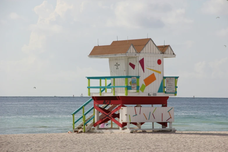 life guard tower at beach near open water