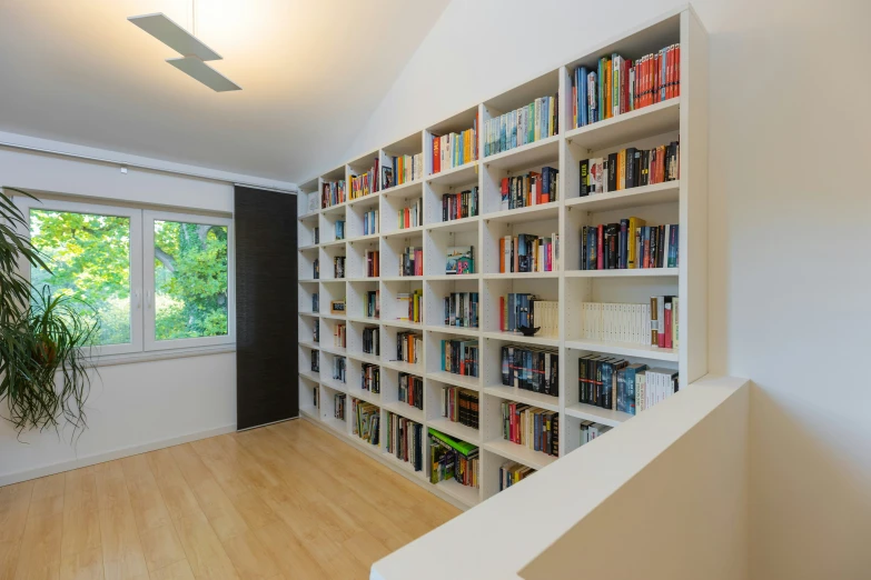 a large book case in the middle of a room