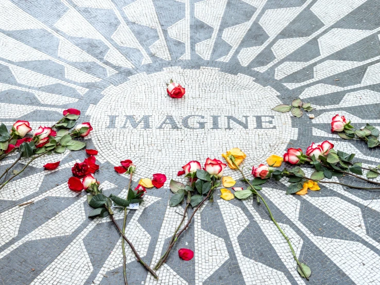 roses lay on the tile of an old mosaic