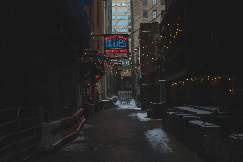 this is an alley with lights around it