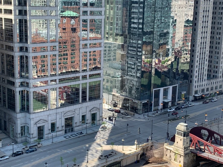 view of buildings in the city looking down at a bridge