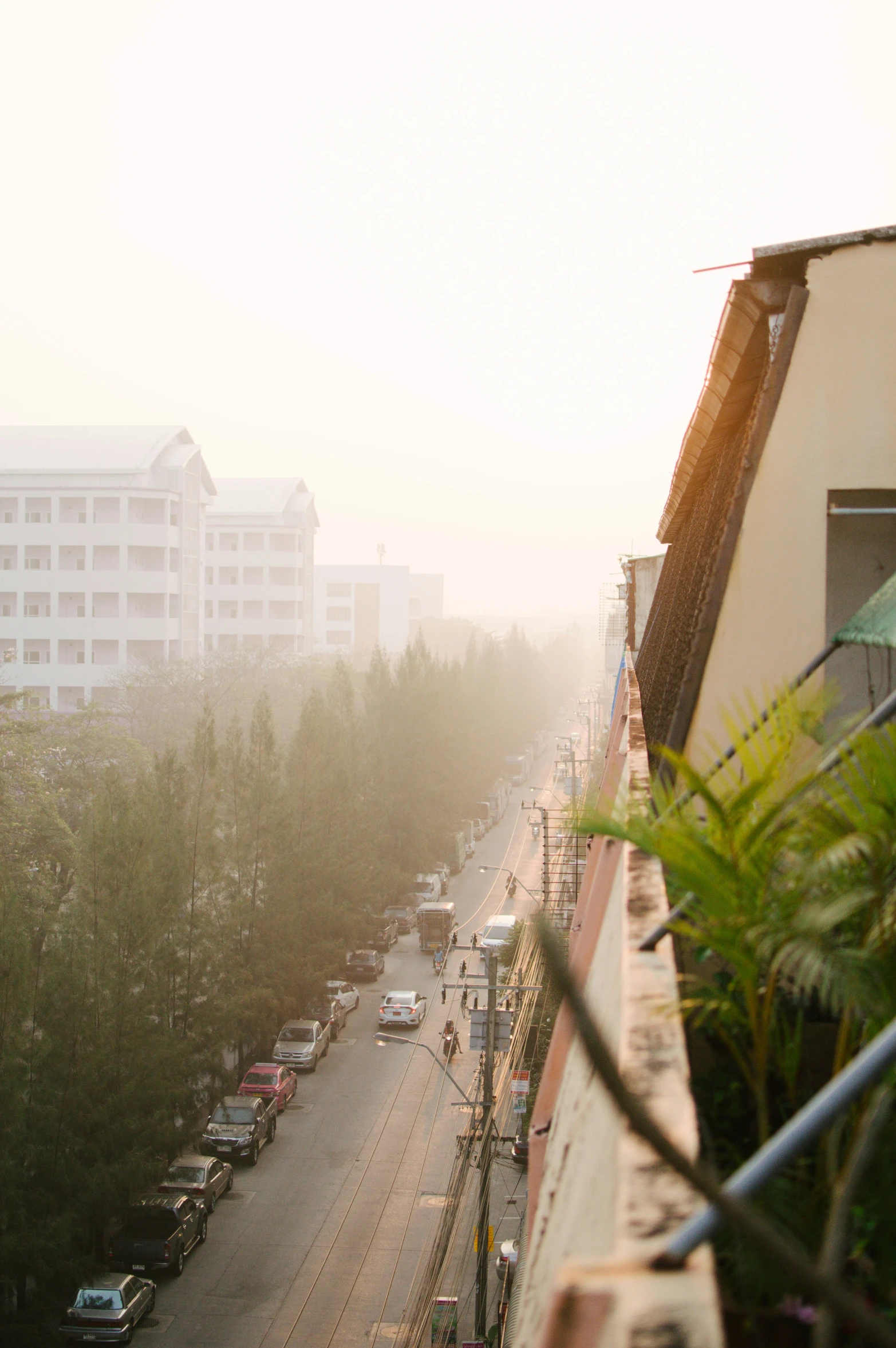 view of a busy street and residential area of a city