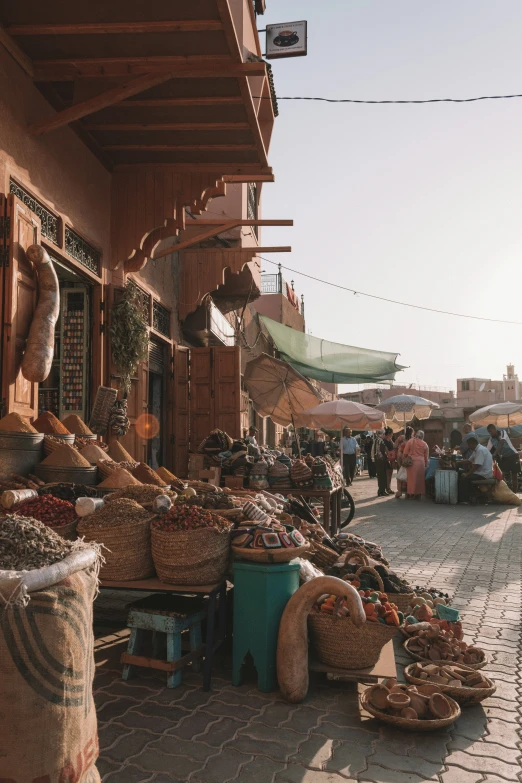 people are outside the outdoor market in morocco