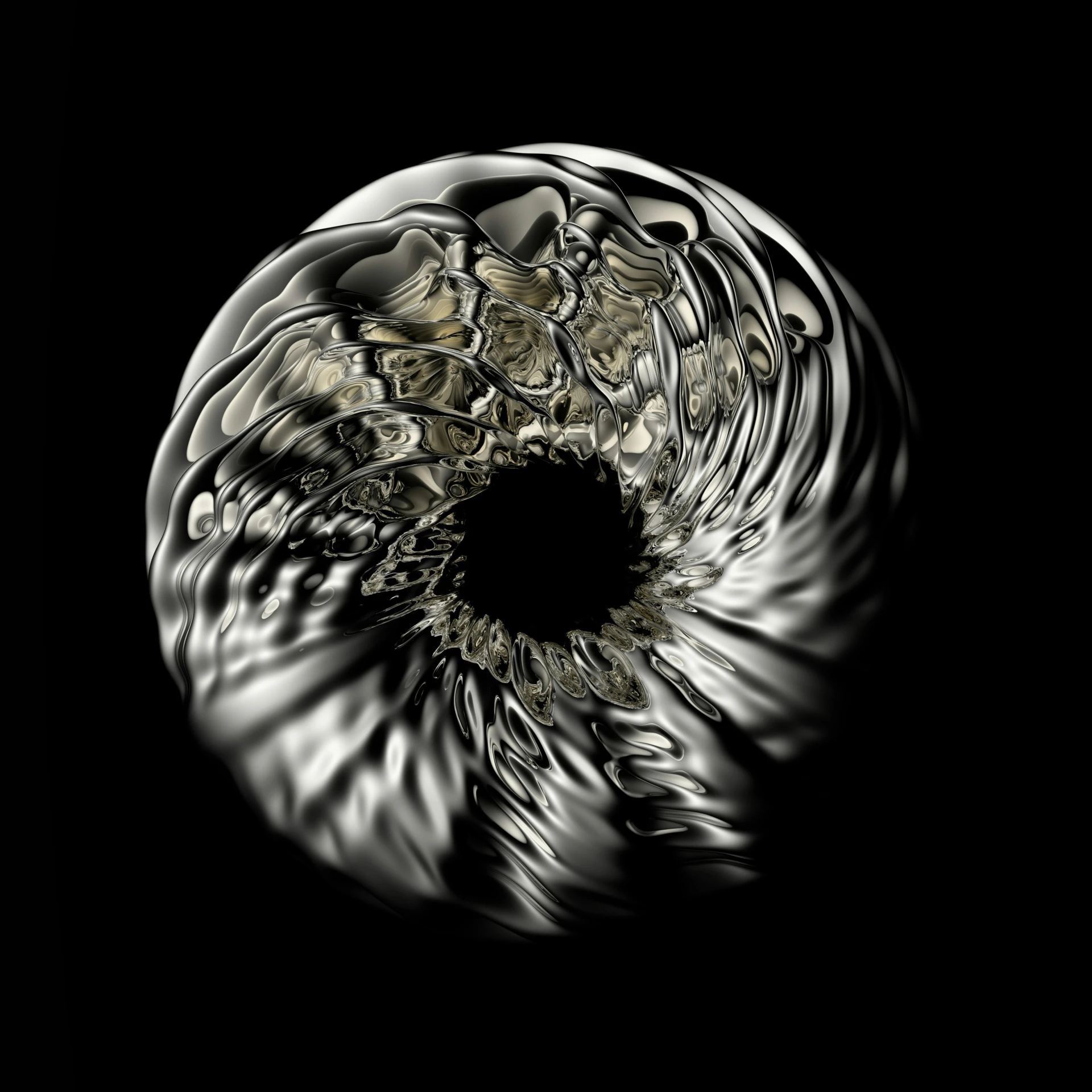 a silver and black object sitting on top of a table