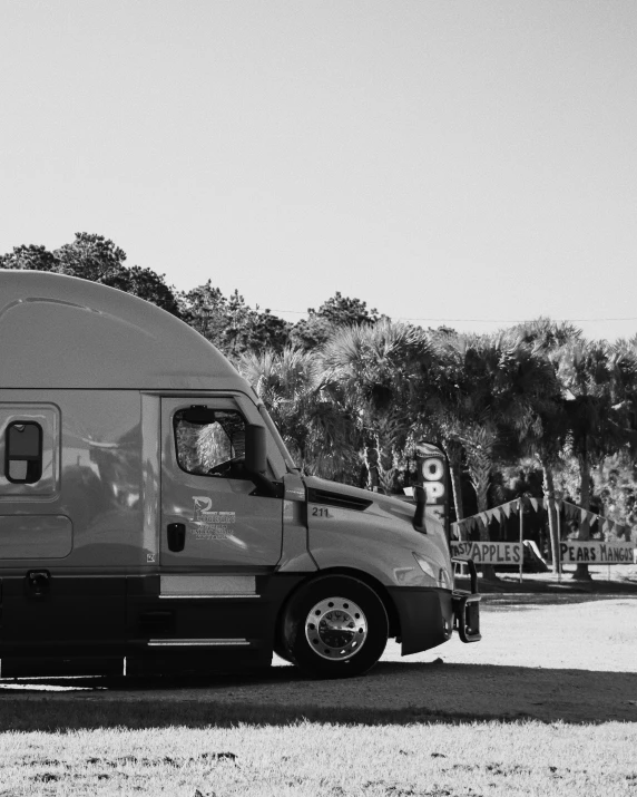 the vehicle is parked and the van is in front