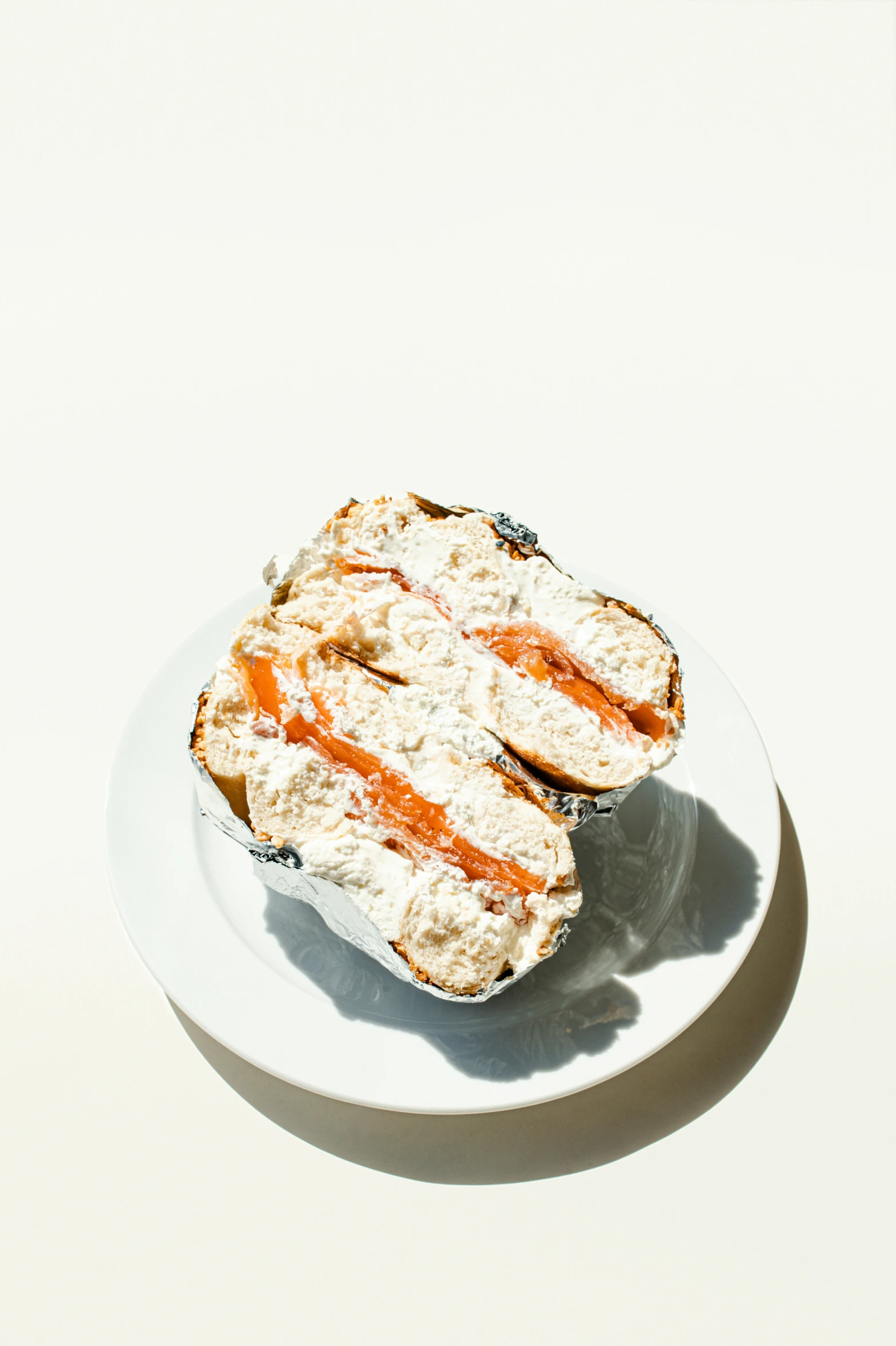 two pieces of bread sitting on top of a white plate