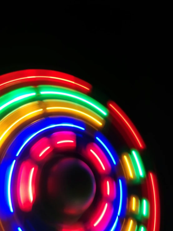 an image of a colorful neon light in the dark