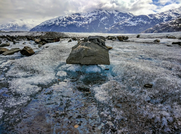 some frozen water and ice in a valley