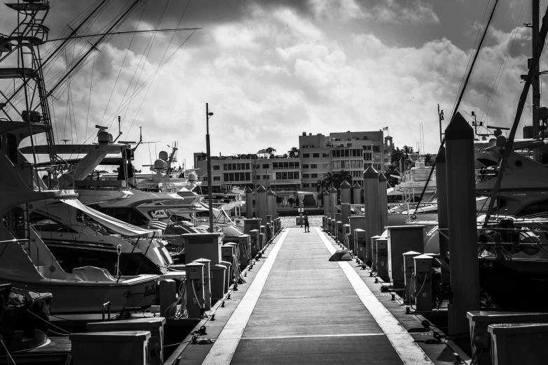 a dock with many boats parked on top of it