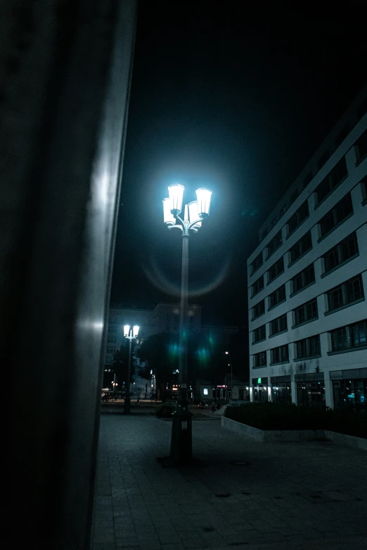 a picture of a city at night with buildings