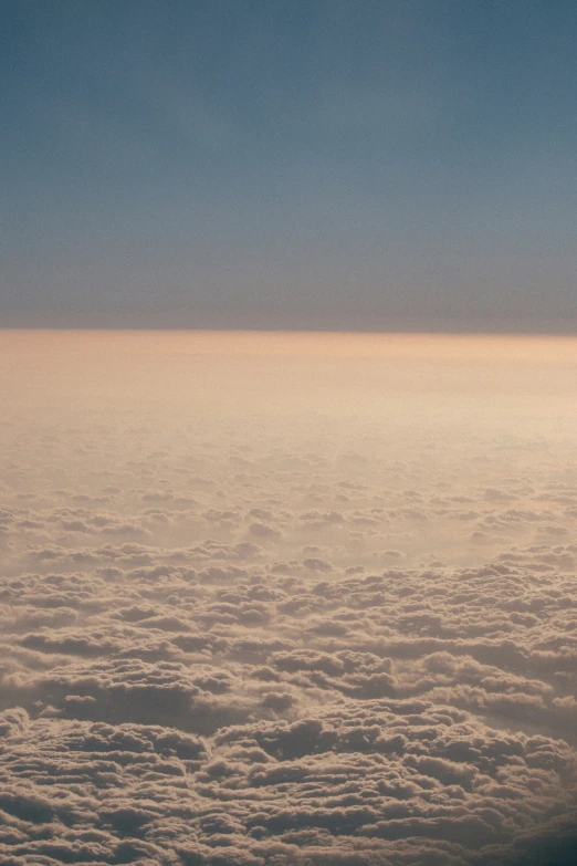 a po looking out over the clouds in the sky