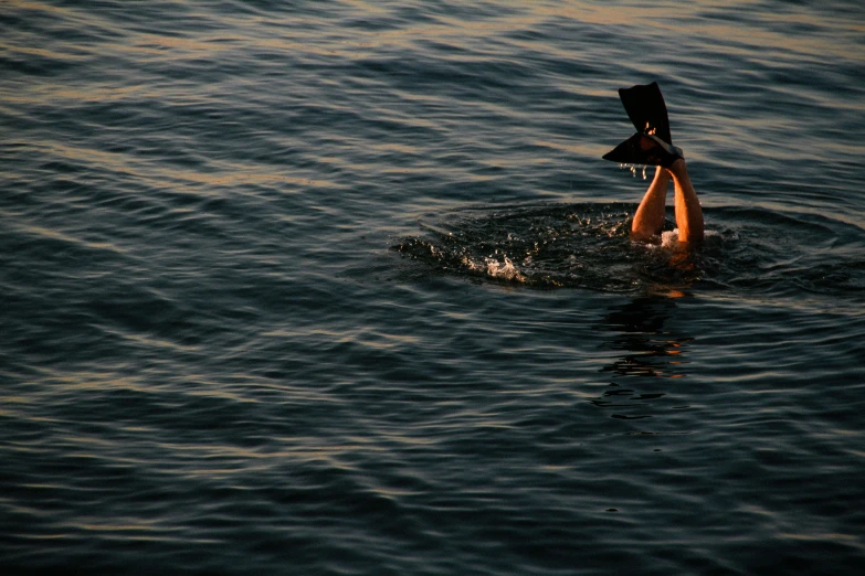 a person with a hat in the water