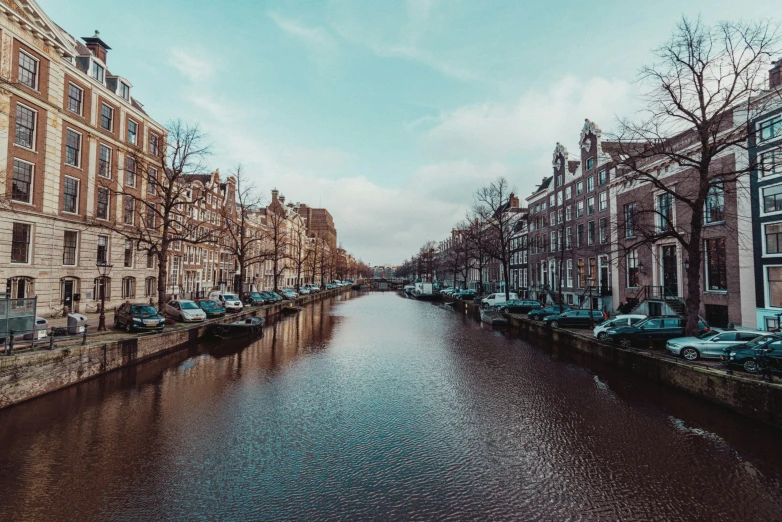 a narrow canal running through an old city area