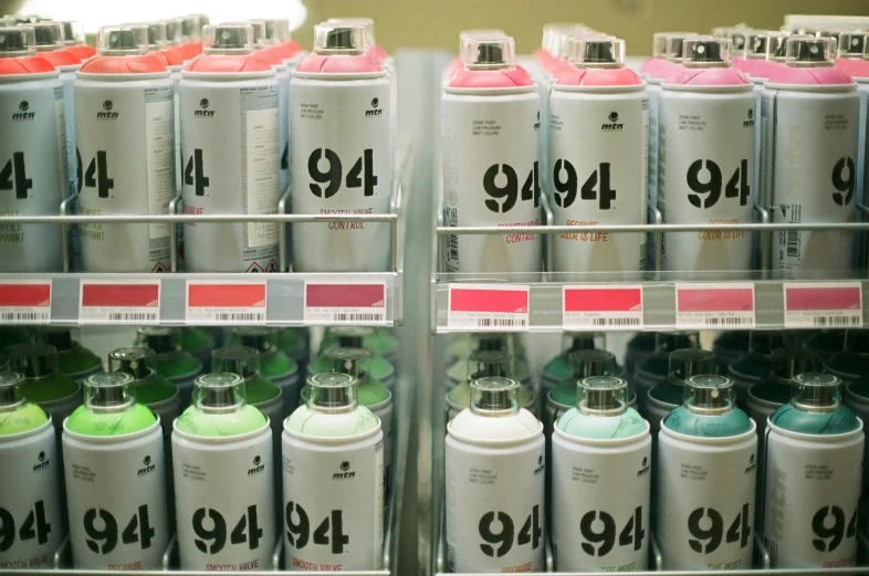 bottles are on display on the rack in a store