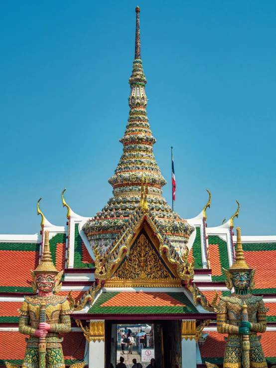 the very elaborate building with statues in front