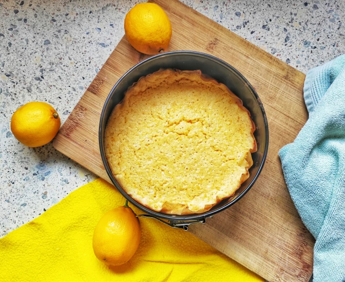 a small cookie is sitting in a pie pan