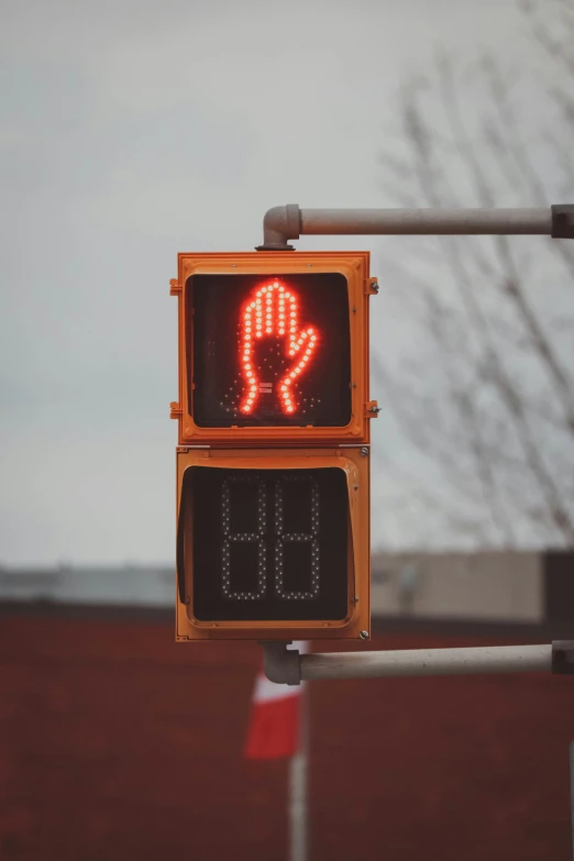 two traffic lights are showing the red light