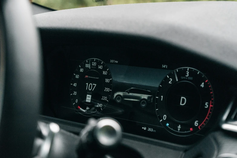 close up view of car's dashboard and interior gauges