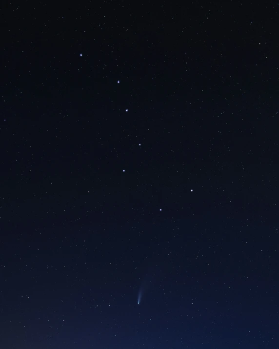 an empty field with lots of stars in the sky