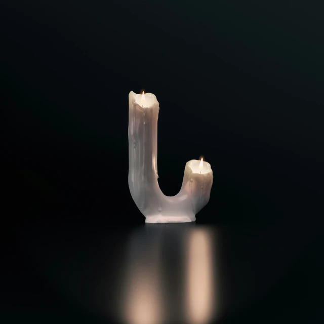 a candle with some lights and one light in it