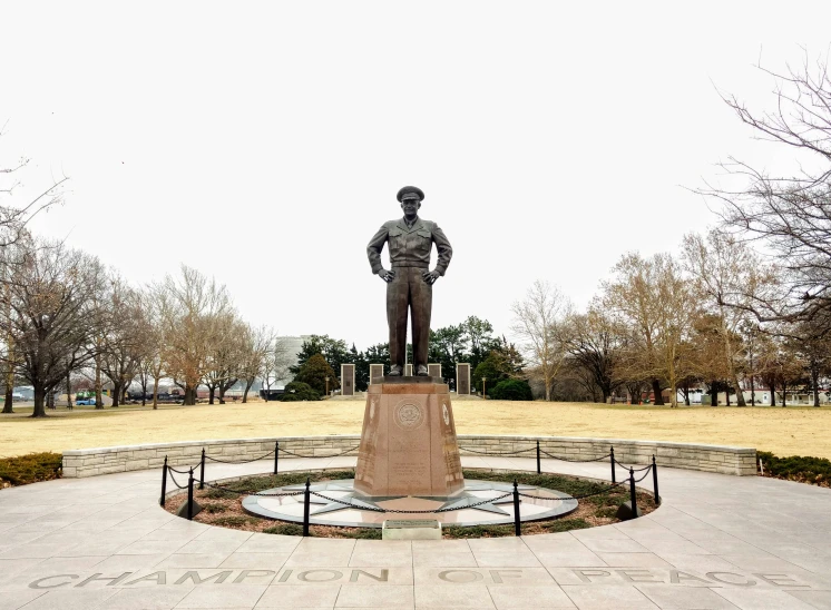 a po of the statue of john garfield in a park