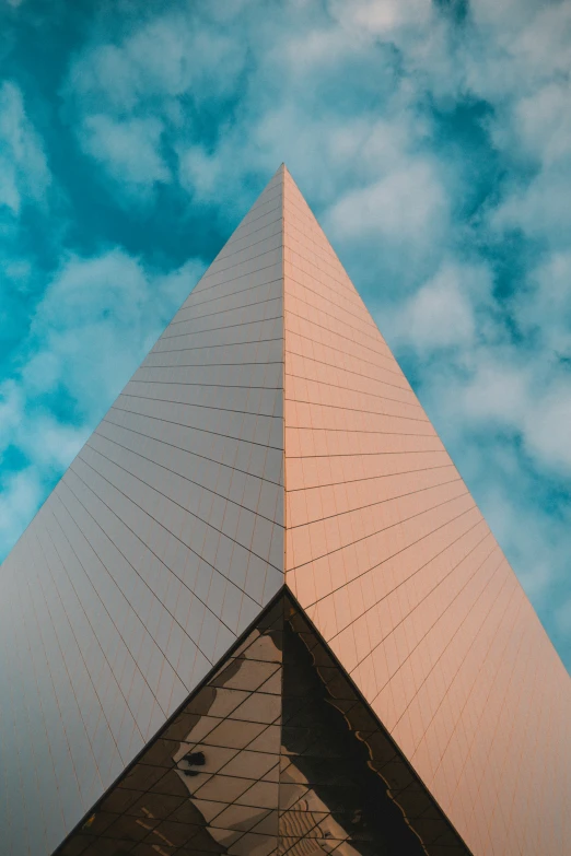 a tall metal structure against a blue sky