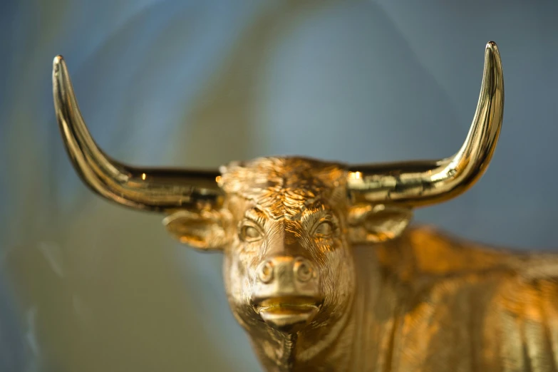 the golden bull statue is very detailed