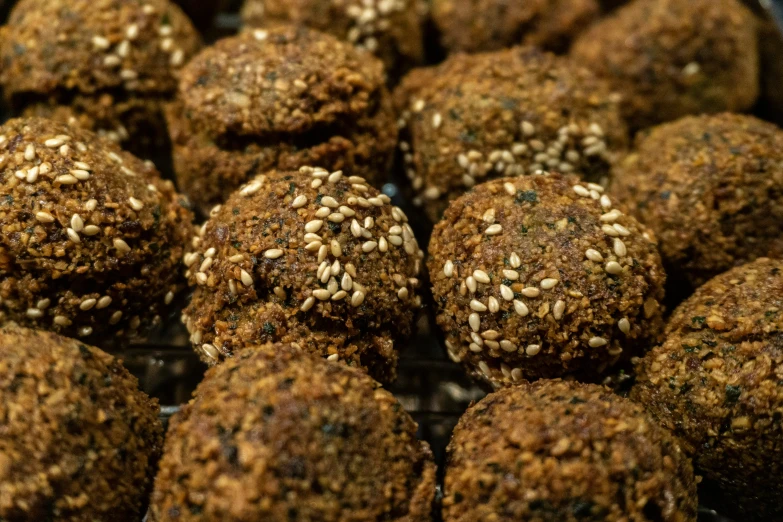 a close up of raw ball food in a bowl