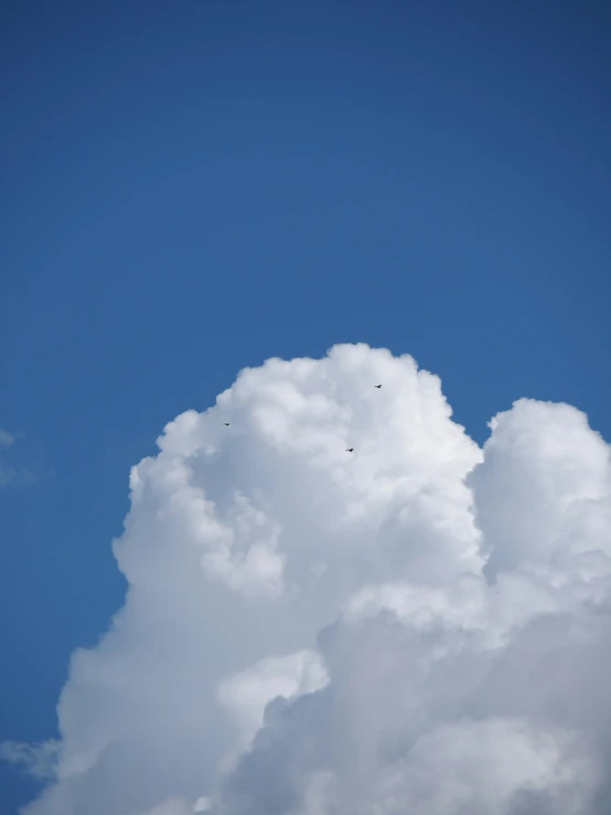 there is a cloud that is very large in the sky