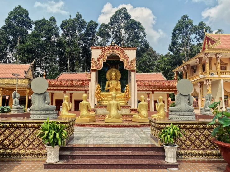 a statue of buddha in a temple setting