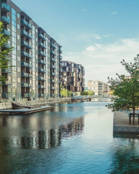 an image of a view of some buildings on a river