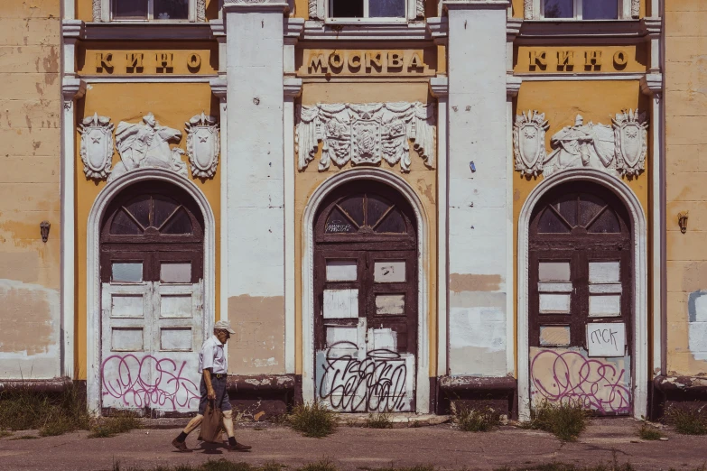 an old building with some graffiti on it