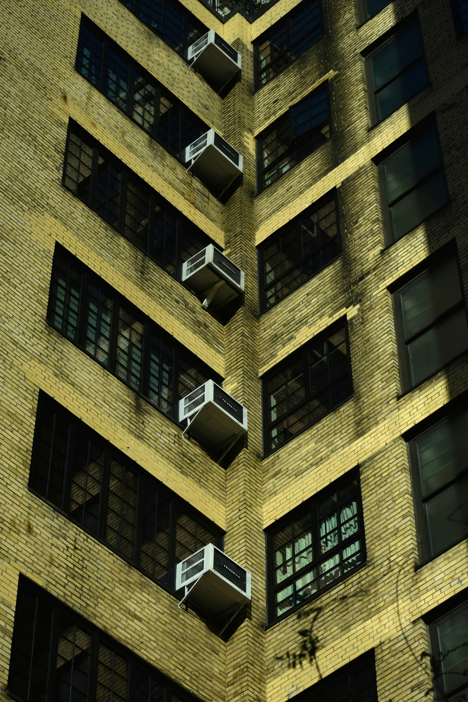 two story buildings have balconies on their windows