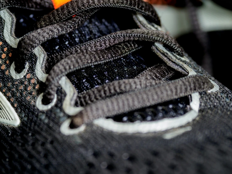 there is a orange on top of the sneaker
