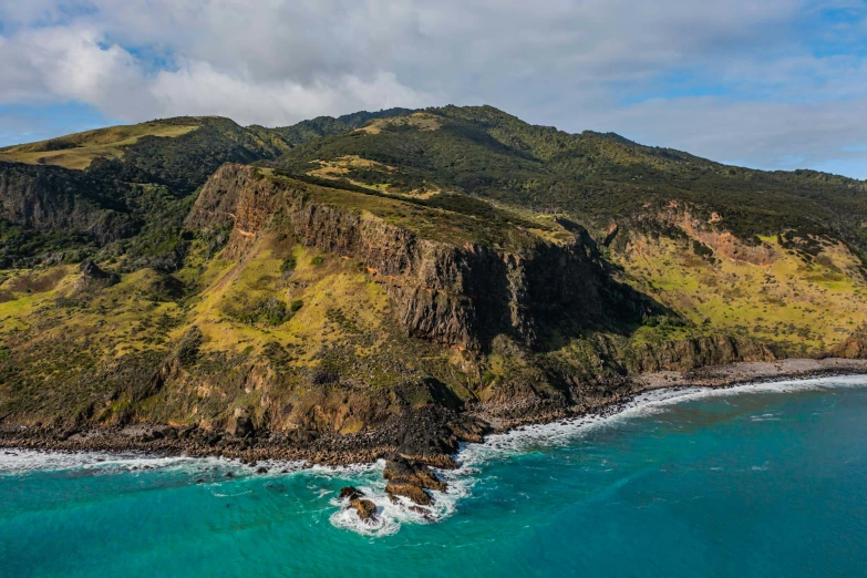 an island on the shore with a large amount of water