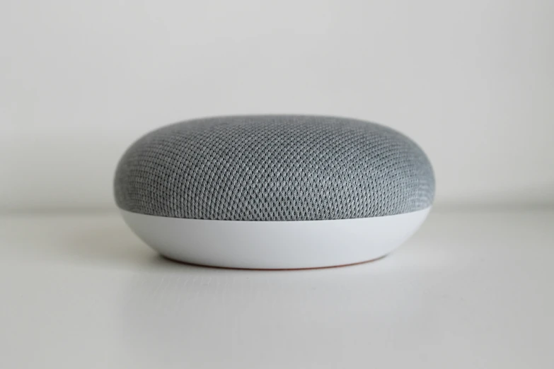 an apple homepod sitting on a table