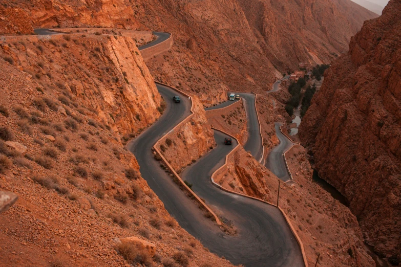 a winding mountain road in the middle of nowhere