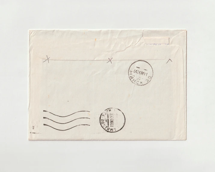 envelope with stamps on it in plain white paper