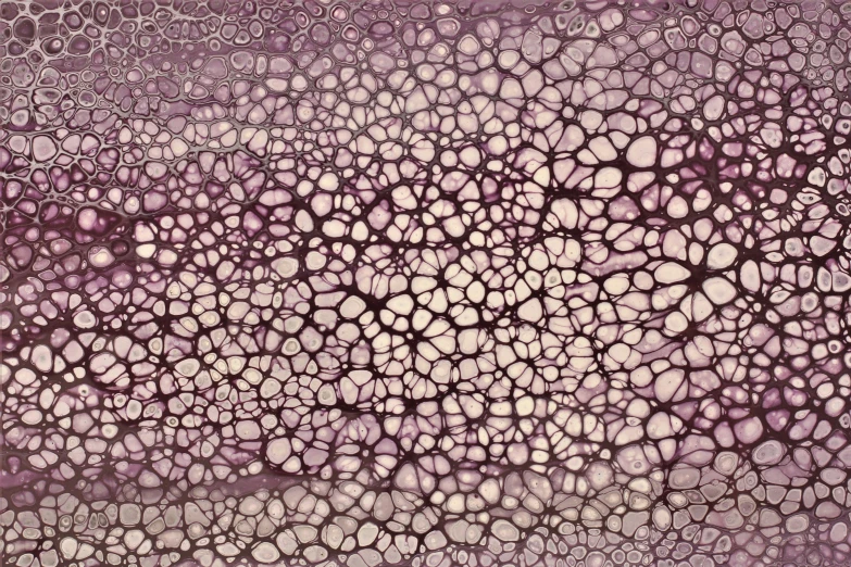 a pattern of purple bubbles on top of a white surface