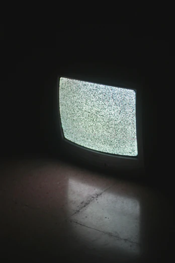a television with no signal in the dark