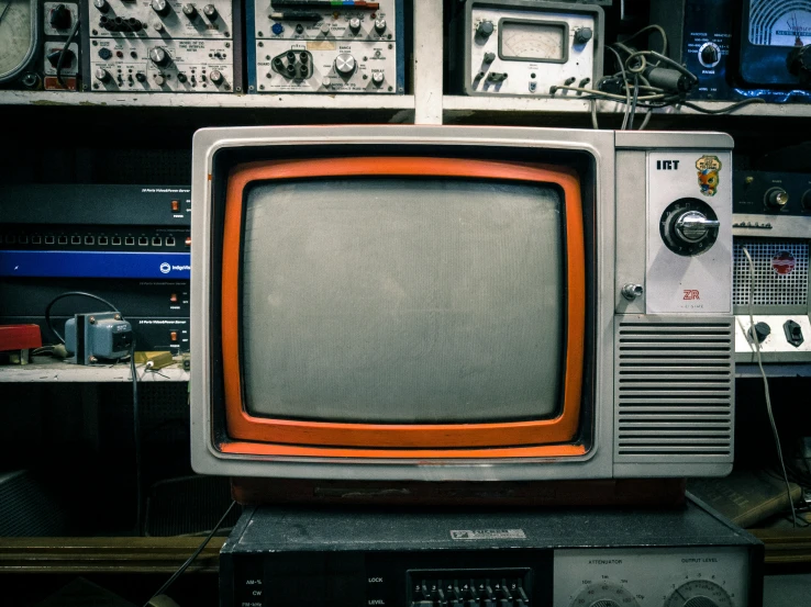 a television set sitting on top of a desk