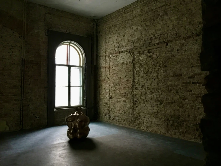 an empty room with a very strange looking window