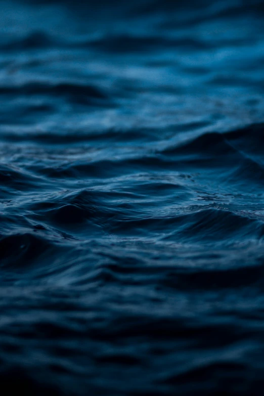 blue water is shown, with the waves coming in